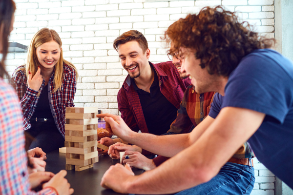 College students playing board games